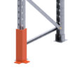 Corner post protector protecting the end frame of a pallet racking bay.
