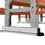 Focus on the runner system of a compacting lonspan shelving bay.